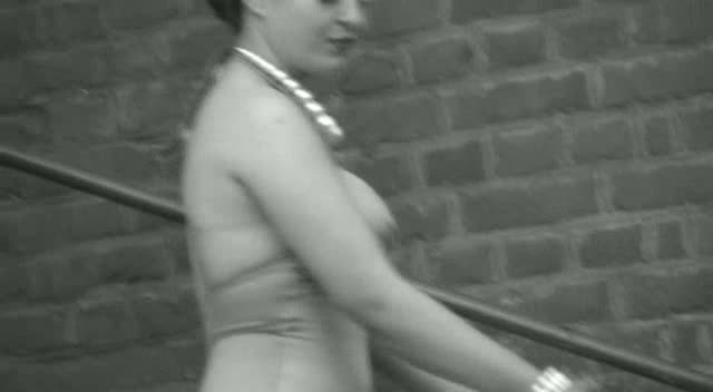 Bathing Beauties film still showing a performer on the stairs