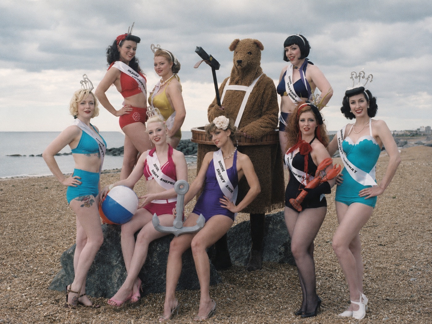 The Bear on Folkestone beach with a bathing-beauties group