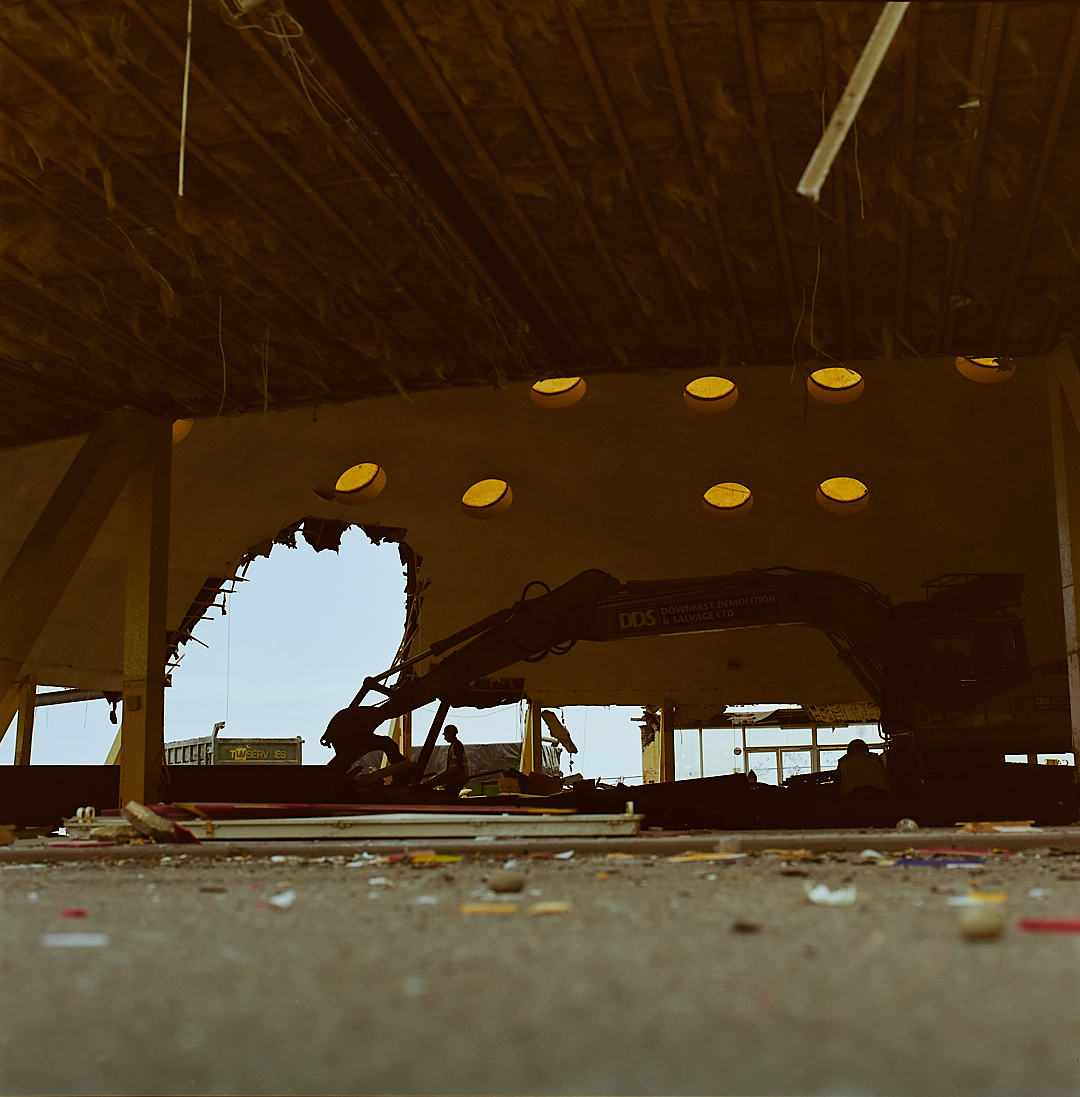 Interior of the Dome during demolition with machinery visible