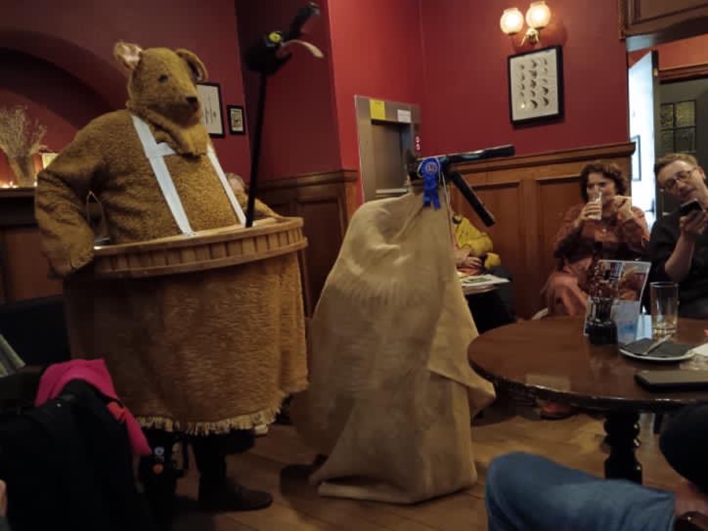 The Bear and Horse facing one another in a pub