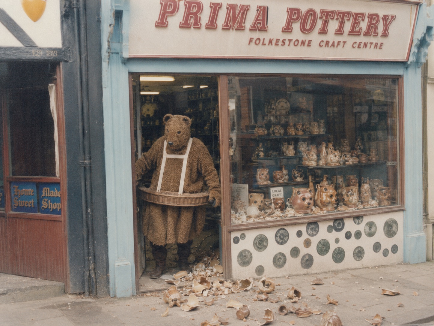 The Bear standing in the doorway of Prima Pottery in Folkestone